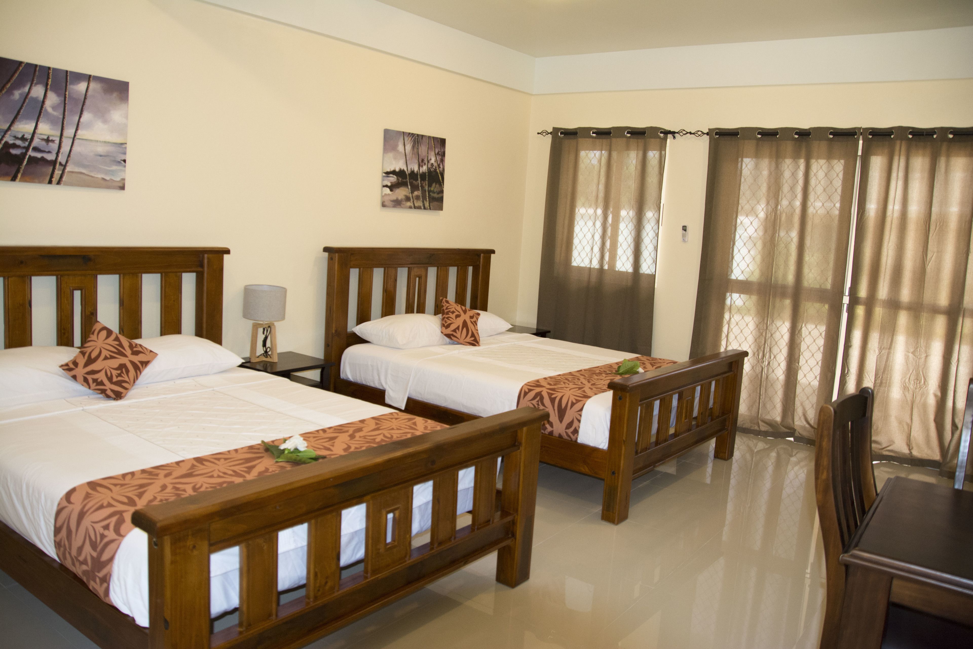 deluxe quadruple room, 2 queen beds, kitchen, mountain view | 1 bedroom, premium bedding, iron/ironing board, wifi