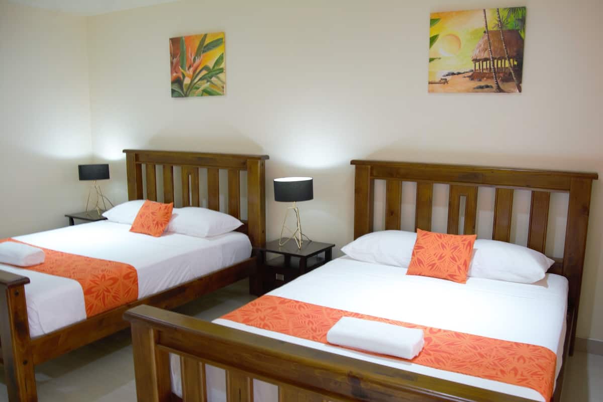 Deluxe Quadruple Room, 2 Queen Beds, Kitchen, Mountain View | Premium bedding, iron/ironing board, WiFi (surcharge), bed sheets