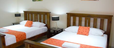 Deluxe Quadruple Room, 2 Queen Beds, Kitchen, Mountain View | Premium bedding, iron/ironing board, WiFi, bed sheets