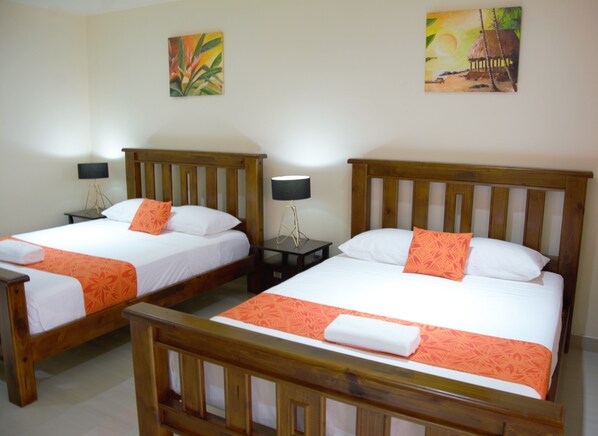 Deluxe Quadruple Room, 2 Queen Beds, Kitchen, Mountain View | Premium bedding, iron/ironing board, WiFi, bed sheets - Samoana Boutique Hotel (Apia)