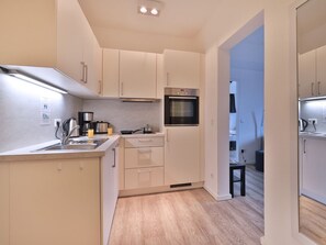 Fridge, oven, dishwasher, coffee/tea maker
