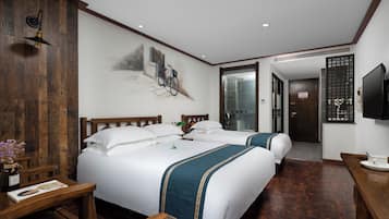 Family Triple Room | Premium bedding, individually decorated, desk, laptop workspace