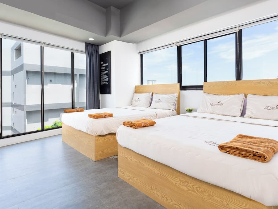Deluxe Quadruple Room, 2 Double Beds, River View | In-room safe, desk, laptop workspace, soundproofing