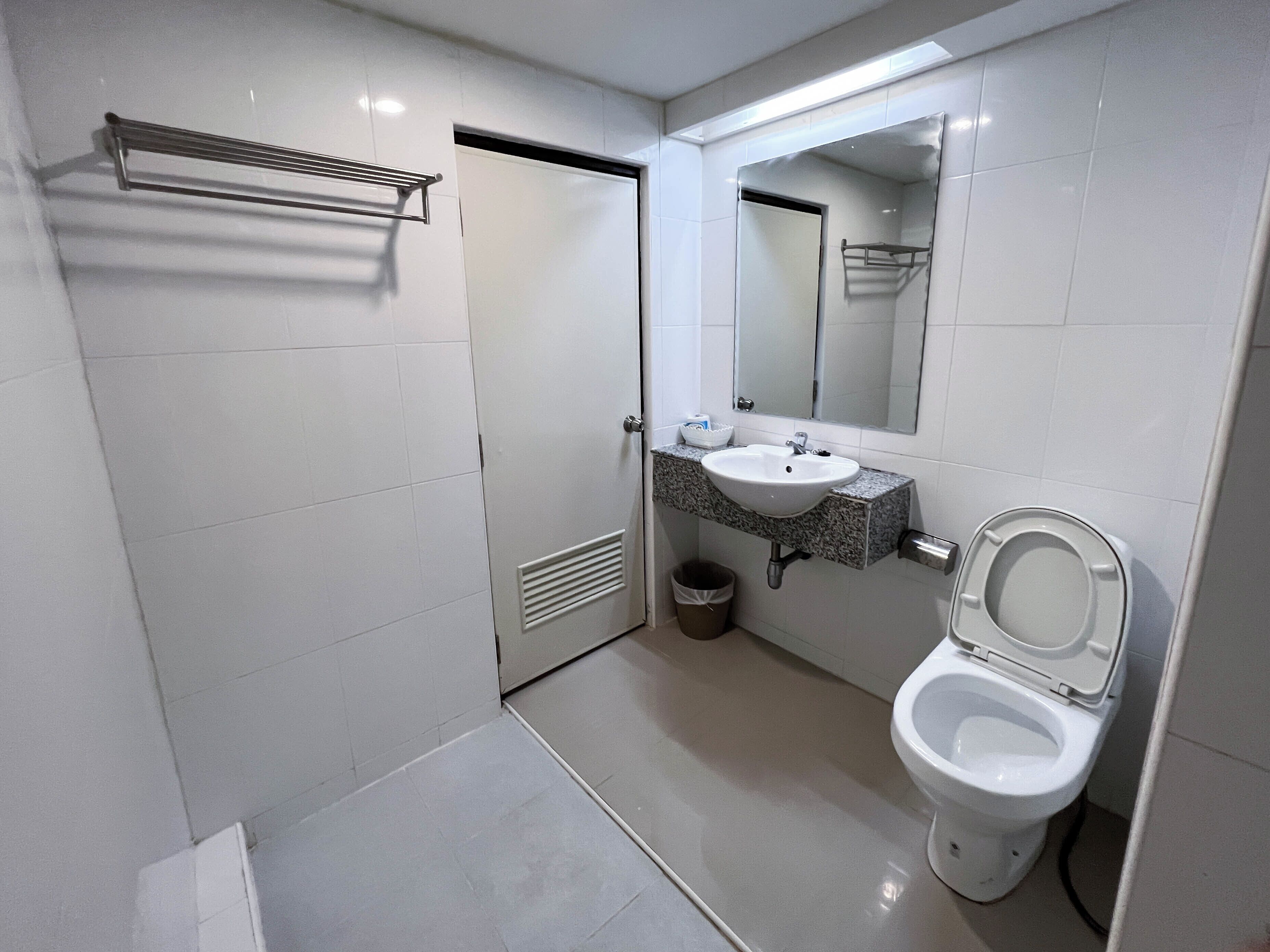 superior twin room | bathroom | free toiletries, hair dryer, slippers, towels