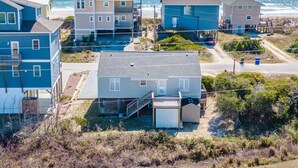A coastal residential area with houses near the beach. - Bella Beach House | Pet Friendly + Beach Access! (North Topsail Beach)