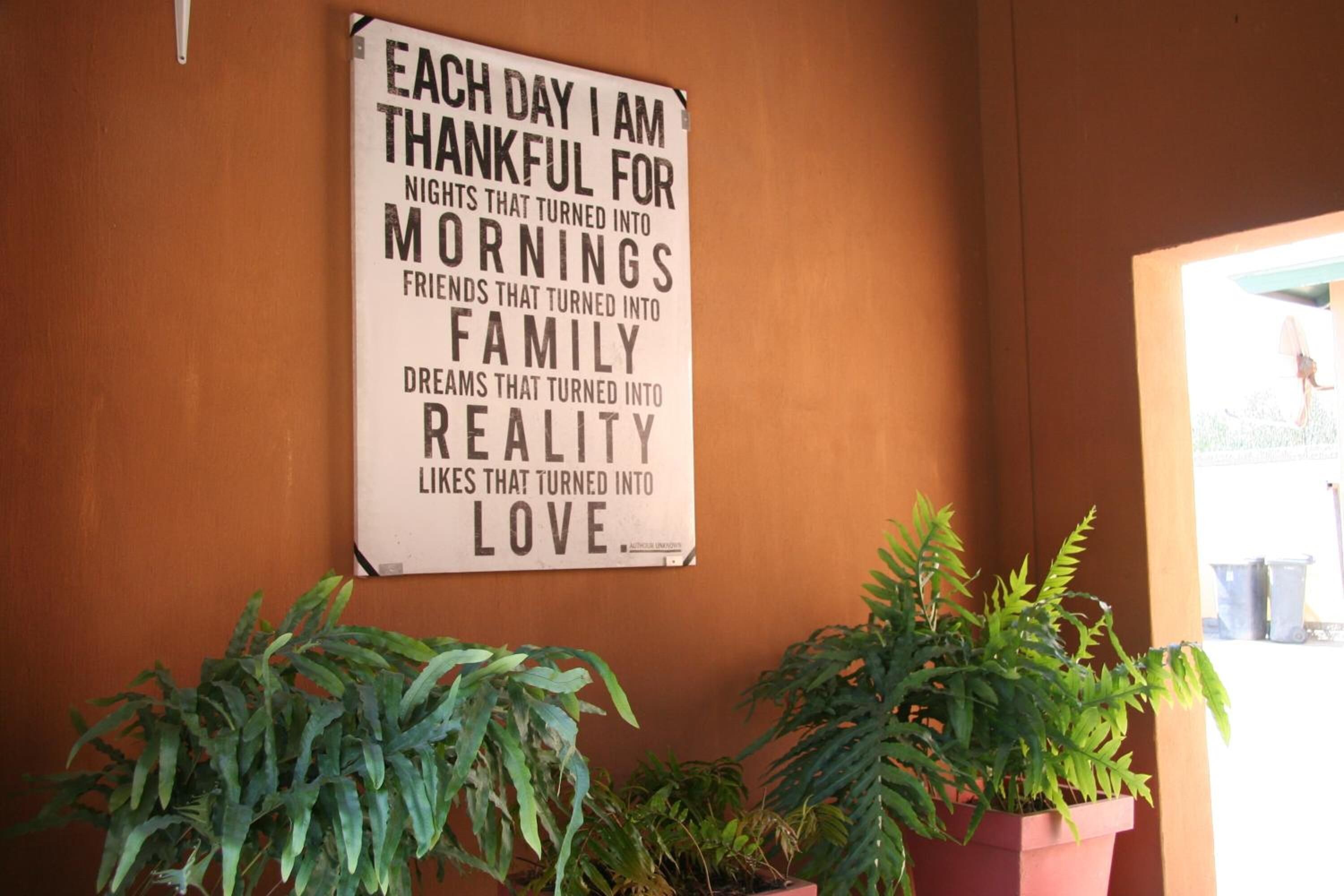 A wall with a motivational quote.