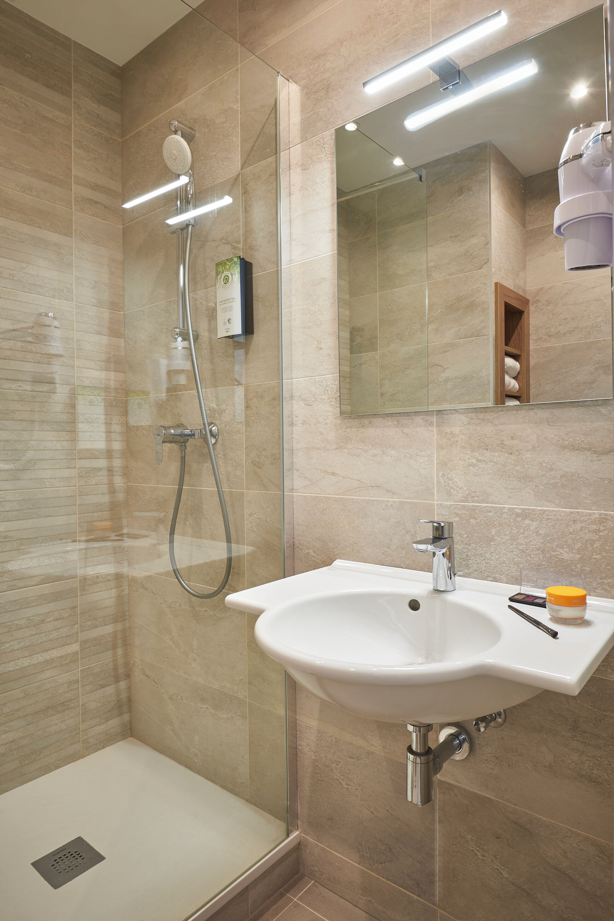 shower, eco-friendly toiletries, hair dryer, towels