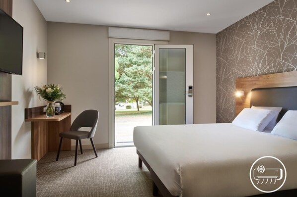 Habitació superior, 1 llit doble | Espai de treball apte per a portàtils i habitacions insonoritzades 