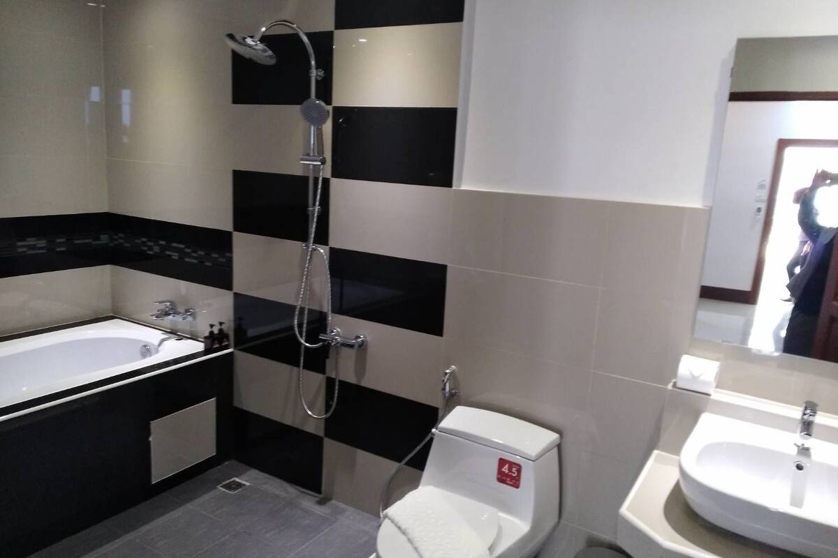 superior twin room | bathroom | free toiletries, hair dryer, bathrobes, slippers