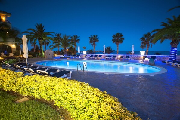 Outdoor pool, pool umbrellas, pool loungers