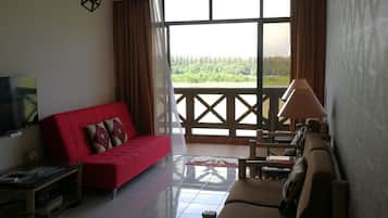 Apartment, 1 Bedroom | Living room | Smart TV