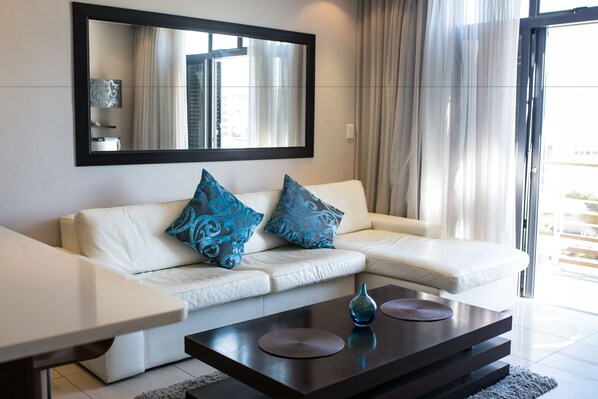 262 Eden On The Bay | Living area | Flat-screen TV