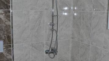 Apartment, 1 Bedroom | Bathroom | Shower, free toiletries, hair dryer, towels