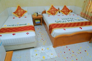 Deluxe Triple Room, River View | Free minibar items, in-room safe, individually furnished, desk - Hotel Shwe Pyi Tan (Mandalay)