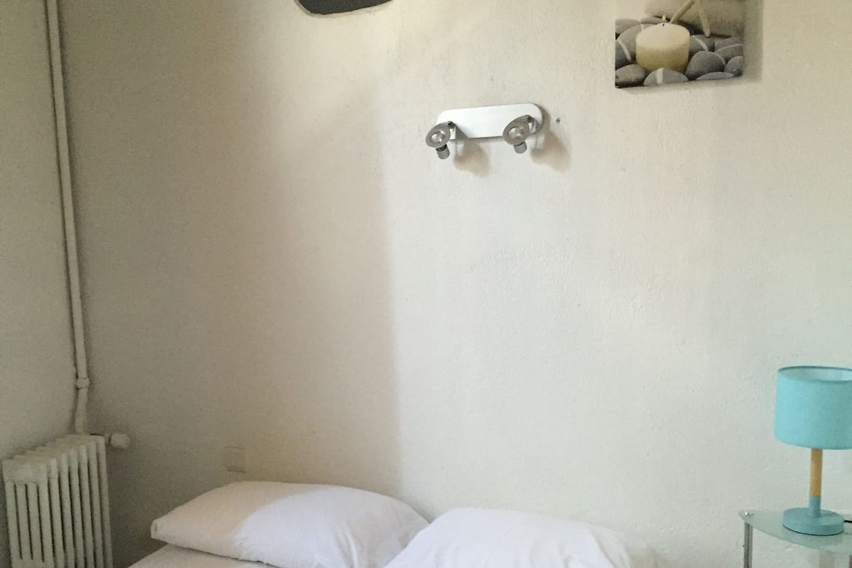 Economy Double Room | Desk, blackout curtains, iron/ironing board, free cots/infant beds