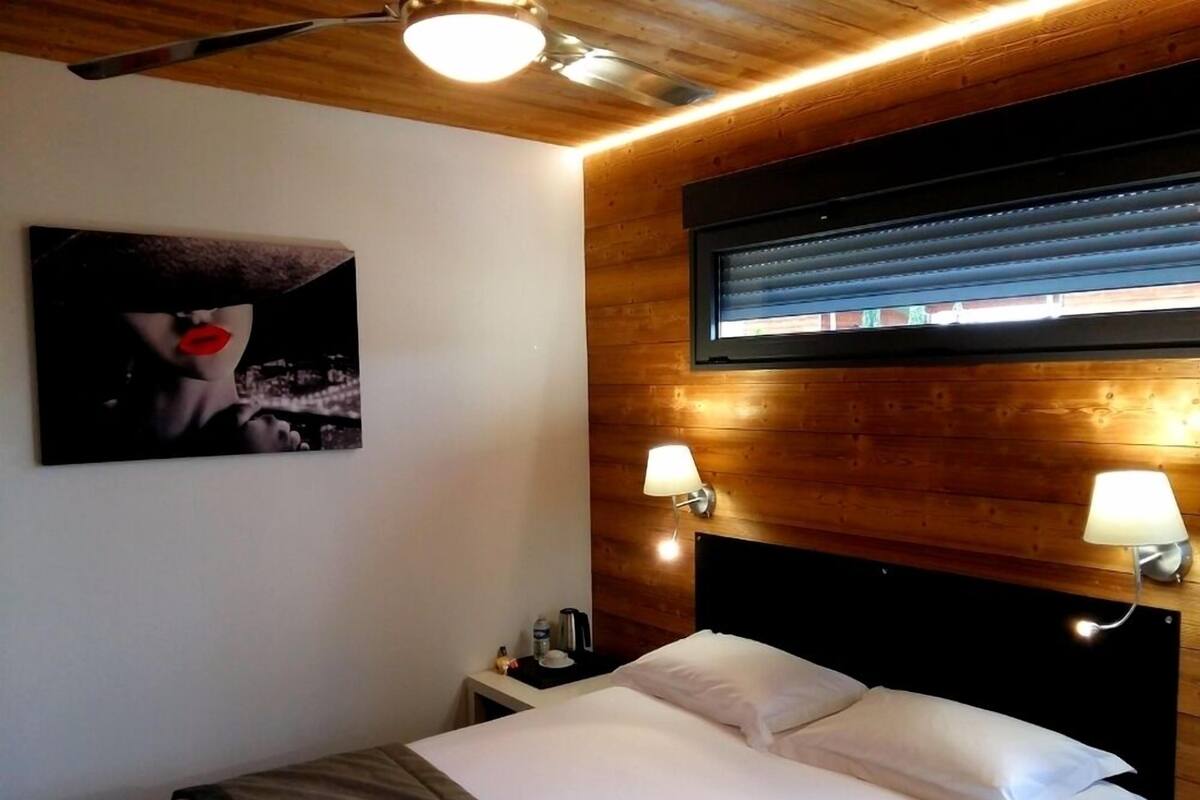 Individually decorated, individually furnished, desk, blackout drapes