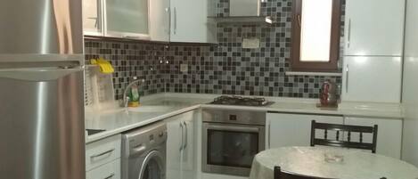 Deluxe Apartment | Private kitchen | Full-size fridge, oven, stovetop, dishwasher