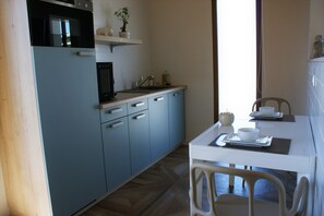 Garden Suite, 3/4 people | Cuisine privée | Bouilloire électrique