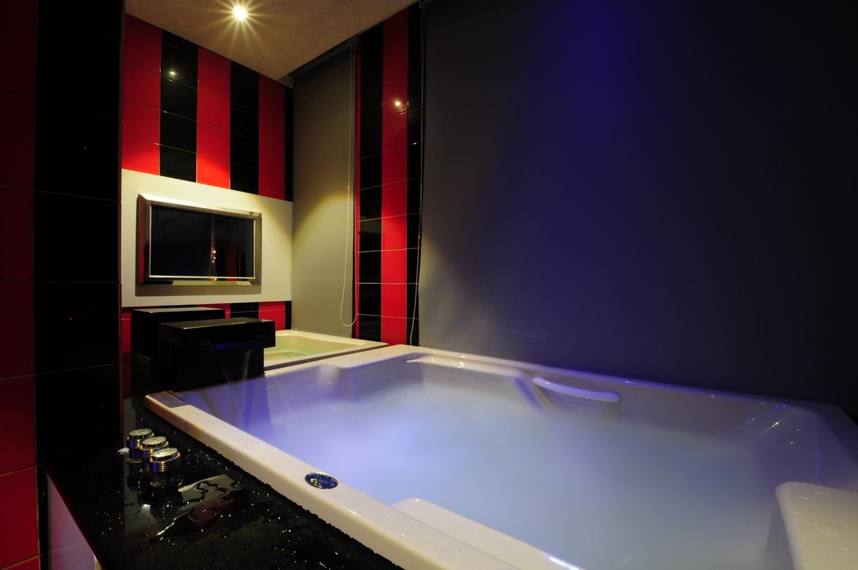 spring water bathtub, free toiletries, hair dryer, slippers