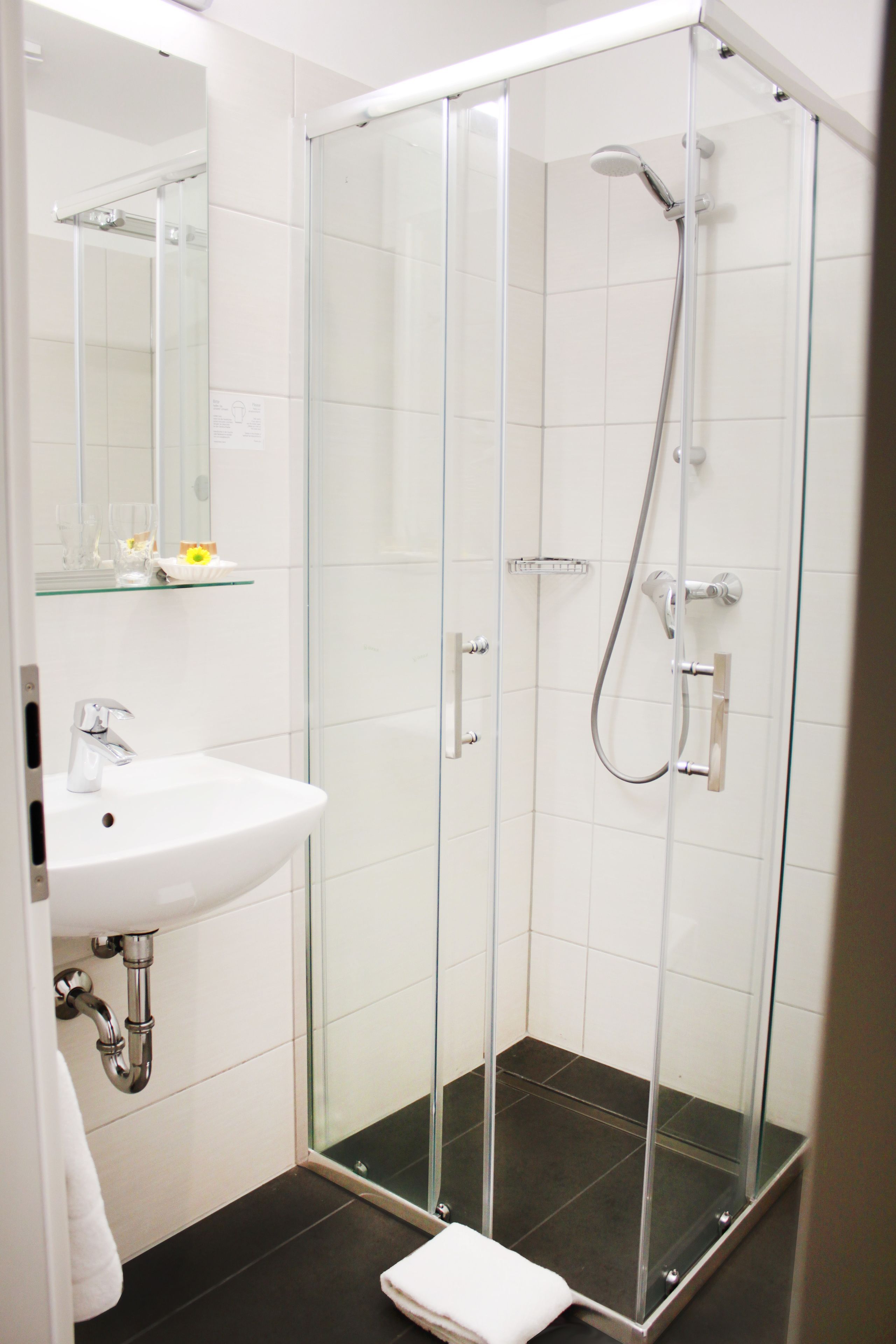 comfort single room | bathroom | shower, free toiletries, hair dryer, slippers