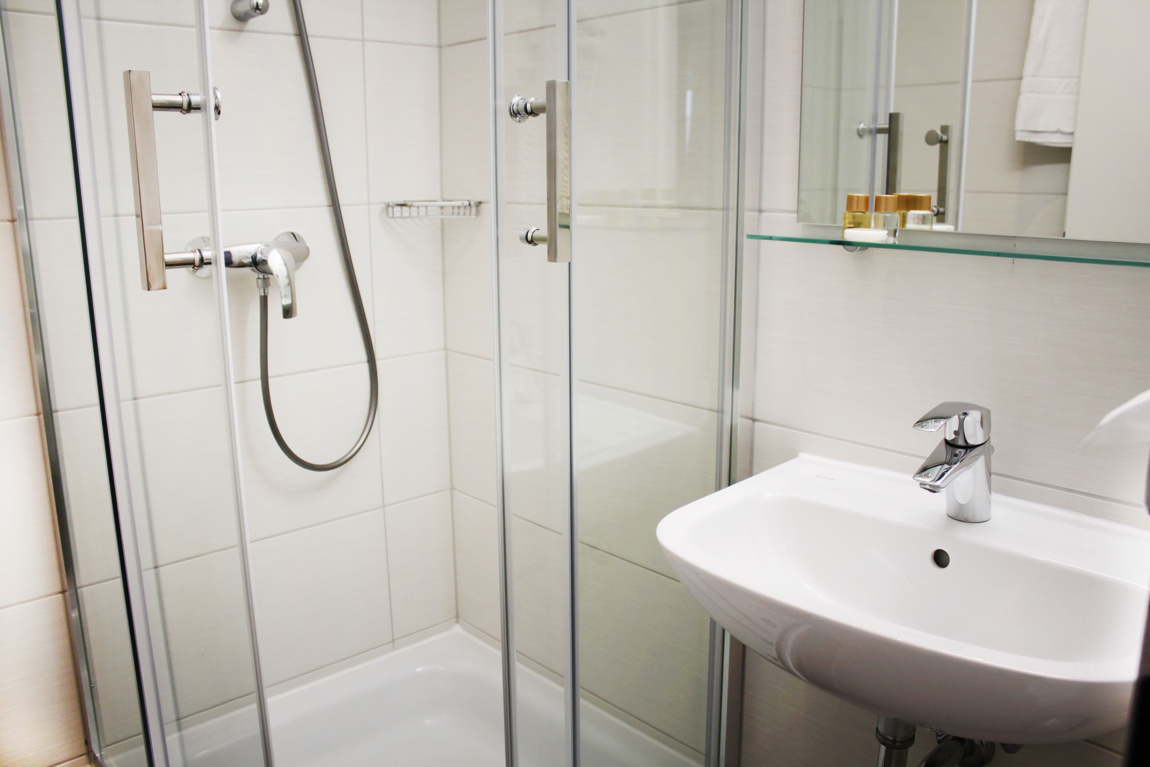 standard double room | bathroom | shower, free toiletries, hair dryer, slippers