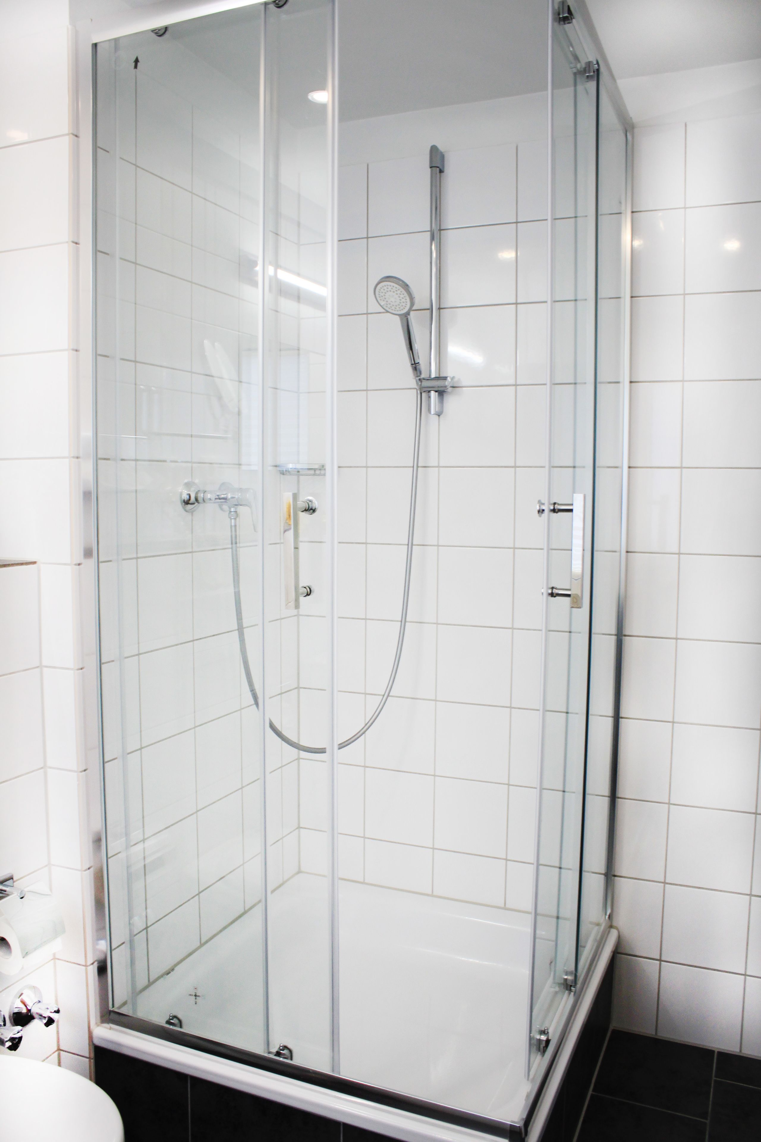family room | bathroom | shower, free toiletries, hair dryer, slippers