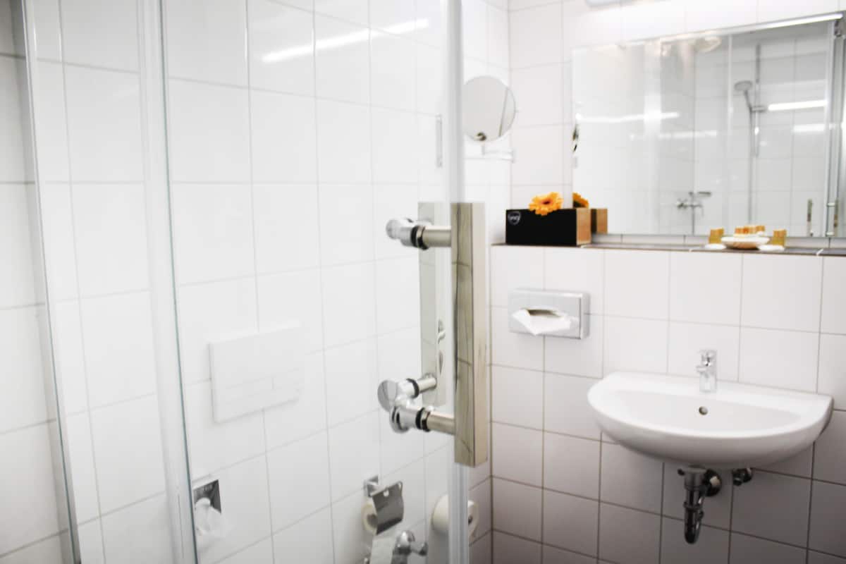 superior triple room | bathroom | shower, free toiletries, hair dryer, slippers