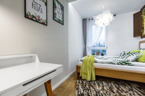 Desk, soundproofing, iron/ironing board, travel cot