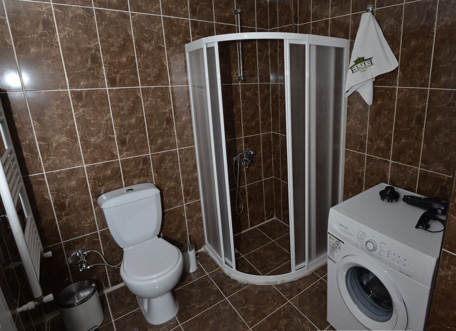 shower, rainfall showerhead, hair dryer, slippers