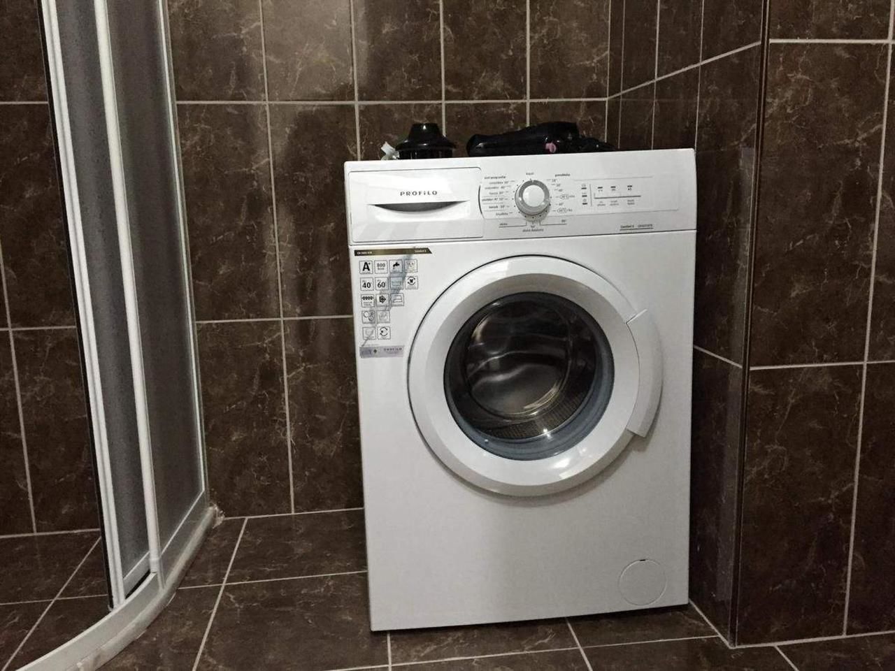 shower, rainfall showerhead, hair dryer, slippers