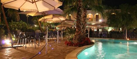 Seasonal outdoor pool, pool umbrellas, pool loungers