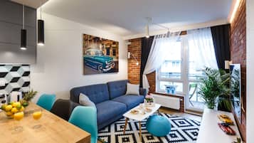 Apartment | Living area | 49-inch flat-screen TV with cable channels, TV