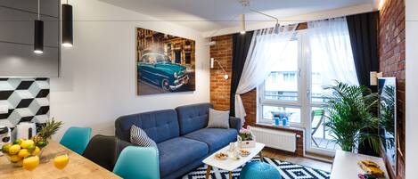 Apartment | Living area | 49-inch flat-screen TV with cable channels, TV