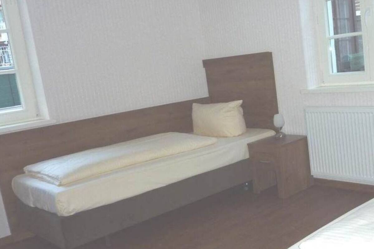 Habitación con 2 camas individuales | Wifi gratis y ropa de cama