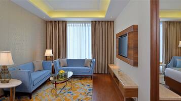 Suite, 1 Bedroom | Minibar, in-room safe, desk, laptop workspace