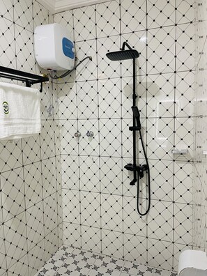 Shower, free toiletries, hair dryer, towels