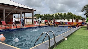 Seasonal outdoor pool, open 10:00 AM to 9:30 PM, free cabanas