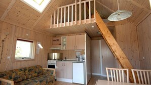 Cottage | Living area | Flat-screen TV - Terrassen Camping & Cottages (Silkeborg)
