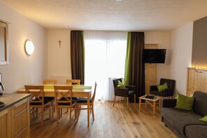 Appartamento Grand | Area soggiorno | TV a schermo piatto