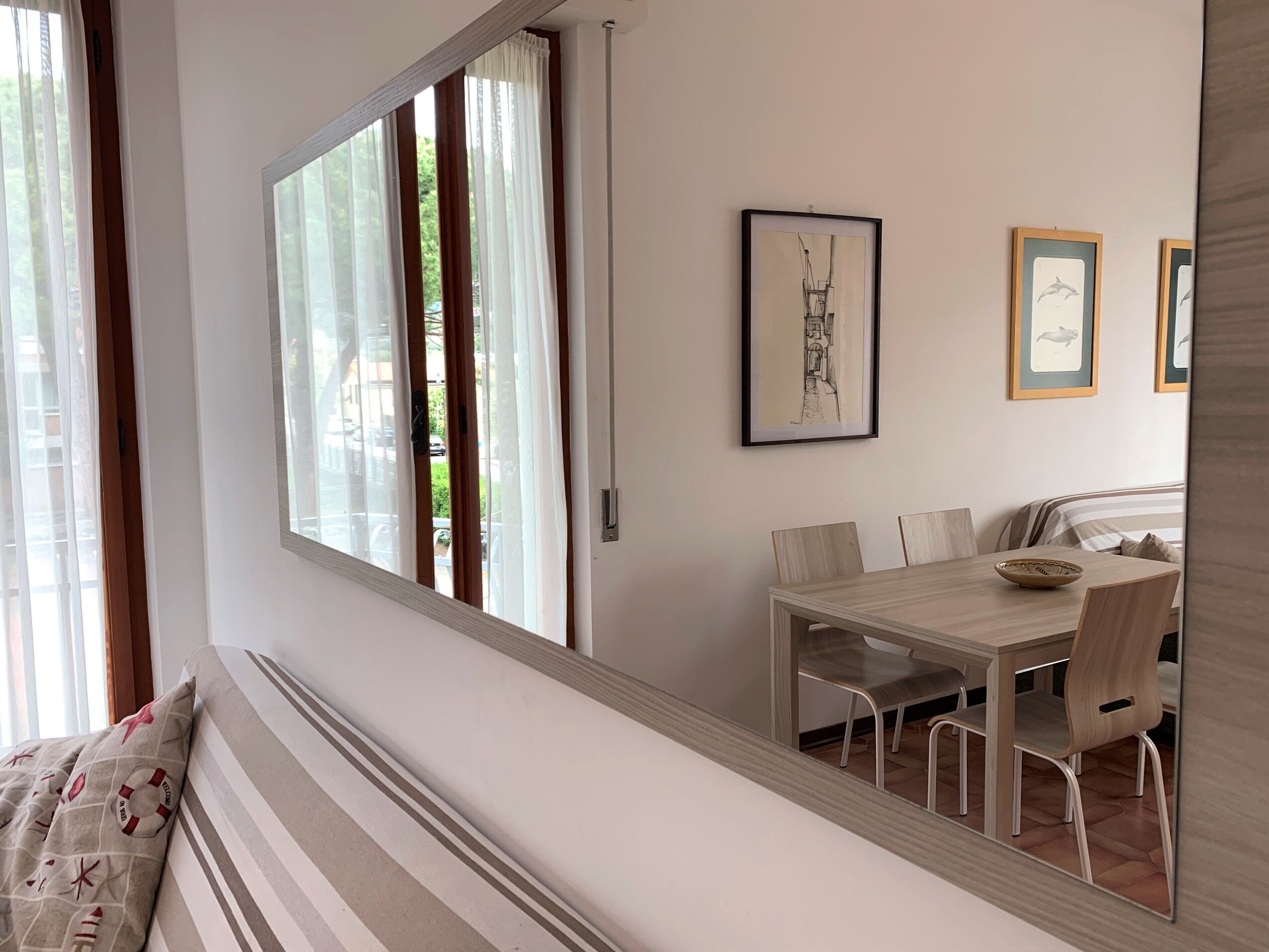 Apartamento (Lella - Via Martiri della Libertà 24) | Sala de estar | TV 20 polegadas com canais a cabo