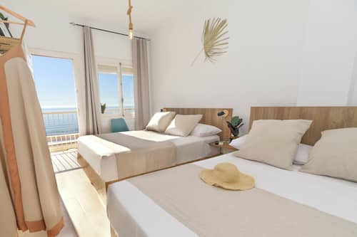 Superior Triple Room, Beach View | Iron/ironing board, free WiFi, bed sheets