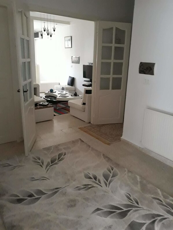 Apartment, 3 Bedrooms | Living area | 32-inch flat-screen TV with satellite channels, TV - Cosy Flat In la Marsa (La Marsa)