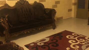 Comfort Apartment, 3 Bedrooms | Living area | 42-inch flat-screen TV with cable channels, TV