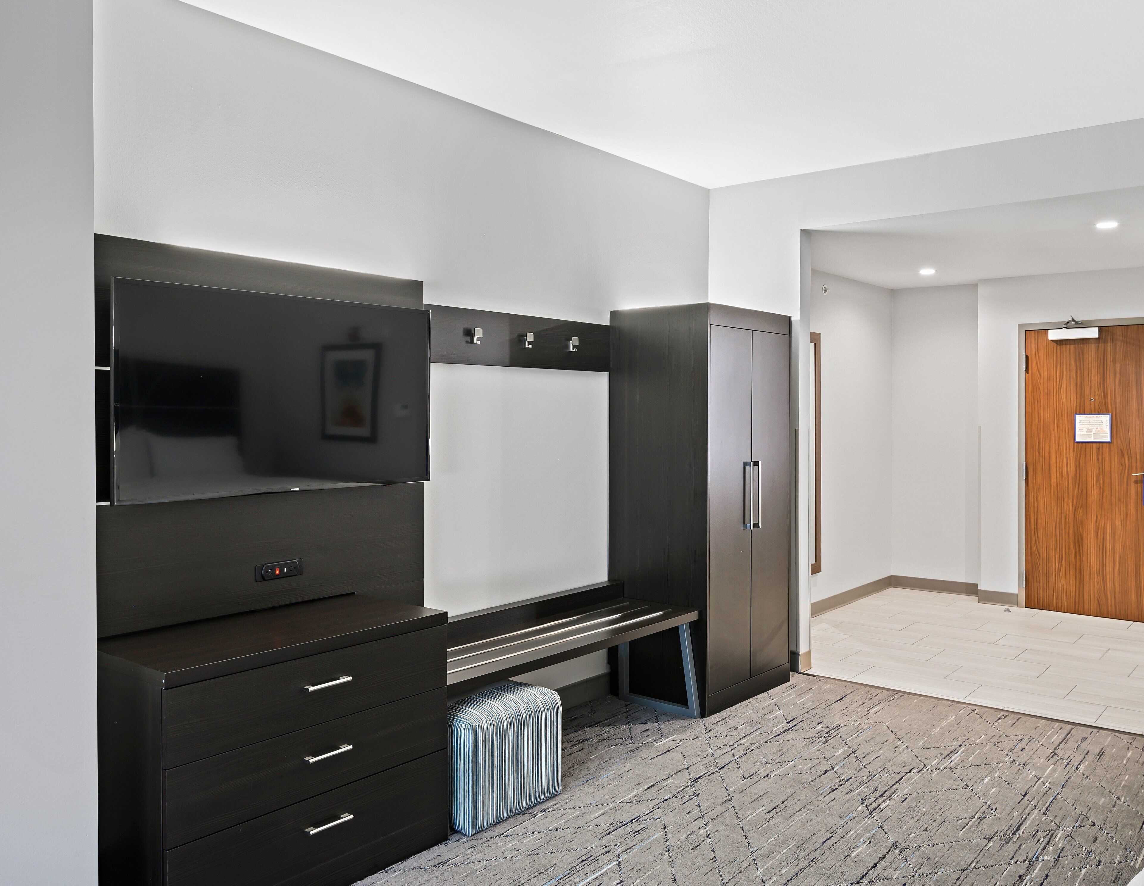 Desk, blackout drapes, iron/ironing board, cribs/infant beds