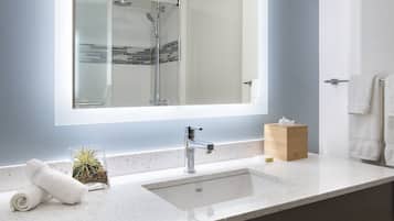 Designer toiletries, hair dryer, towels, soap