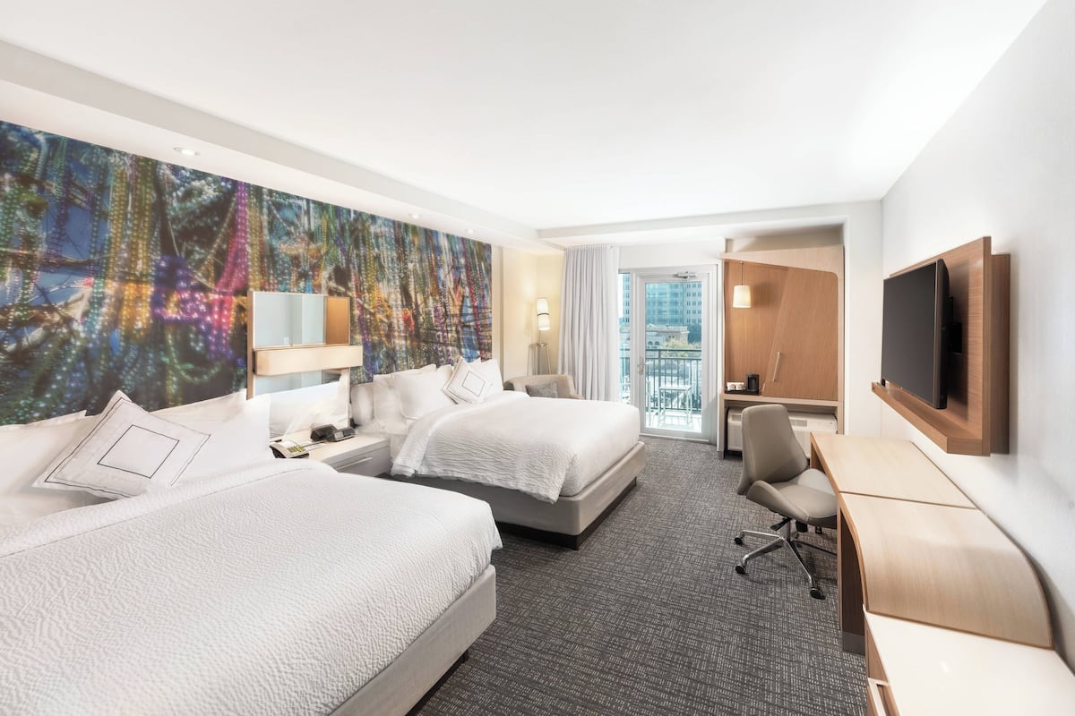 Premium bedding, down duvets, in-room safe, desk