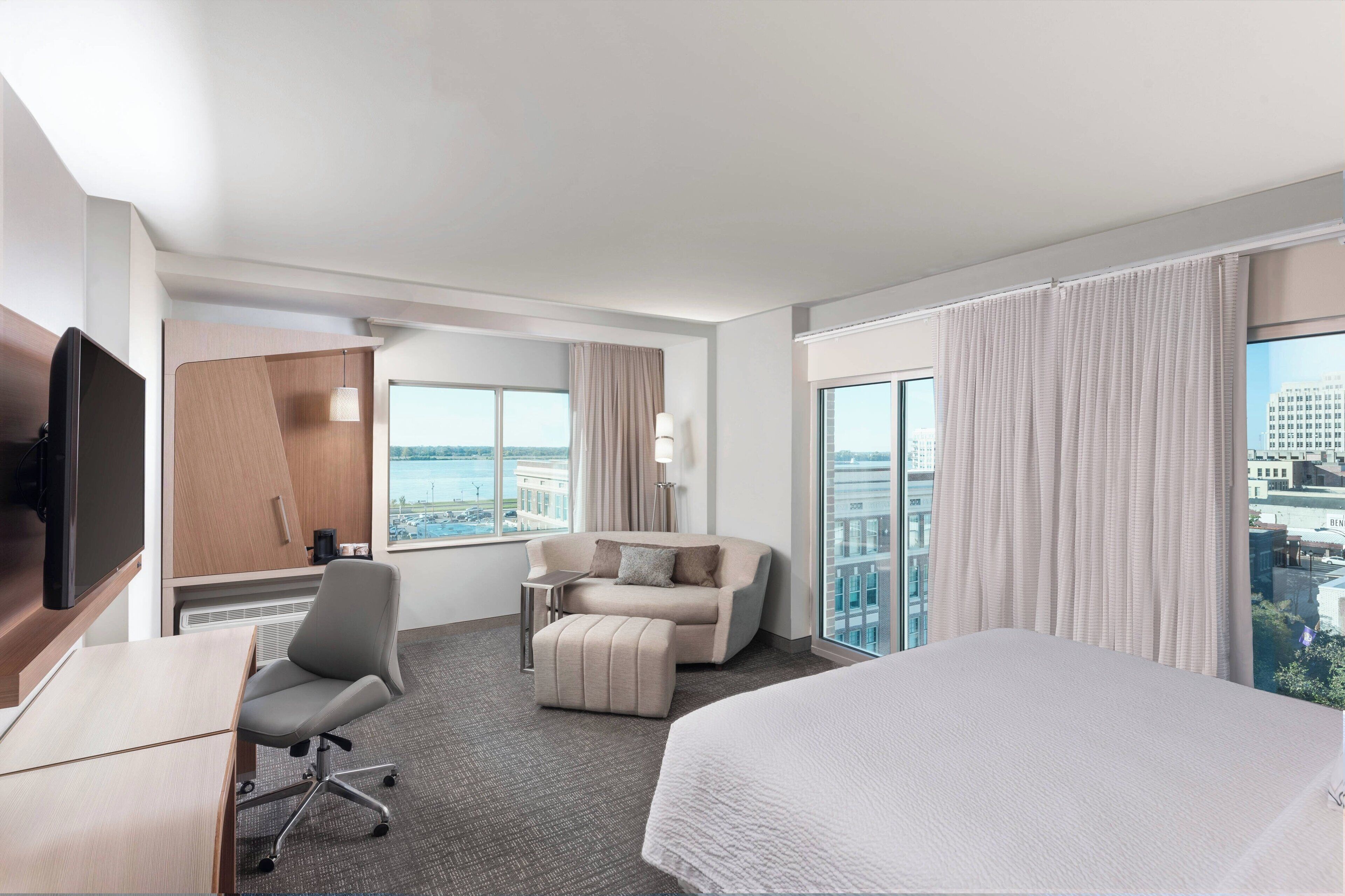 premium bedding, down duvets, in-room safe, desk