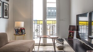 Apartment, 1 Bedroom | Living area | 55-inch flat-screen TV with satellite channels, TV - Muse House (La Marsa)