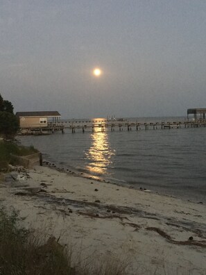 On the beach, sun-loungers