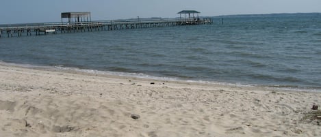 On the beach, sun-loungers